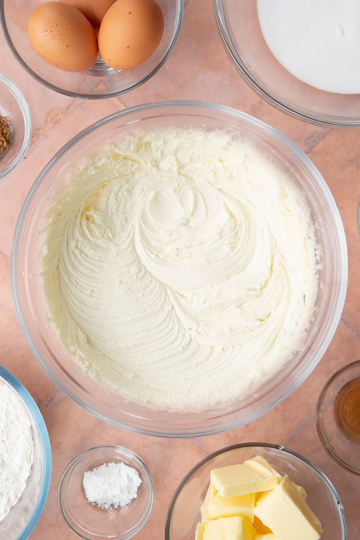 white chocolate buttercream icing in a large clear bowl. 