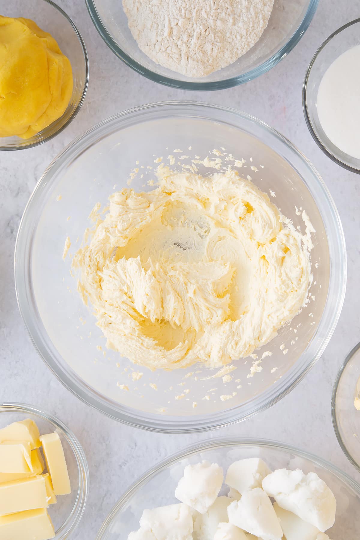 Whisking the butter and sugar until pale.