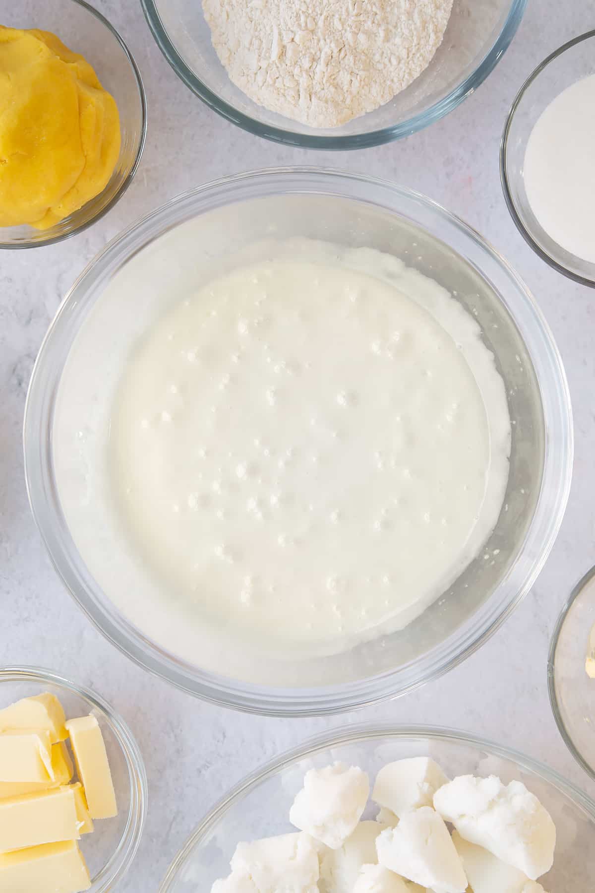 Bowl of icing having been heated gently and stirred occationally until melted together.