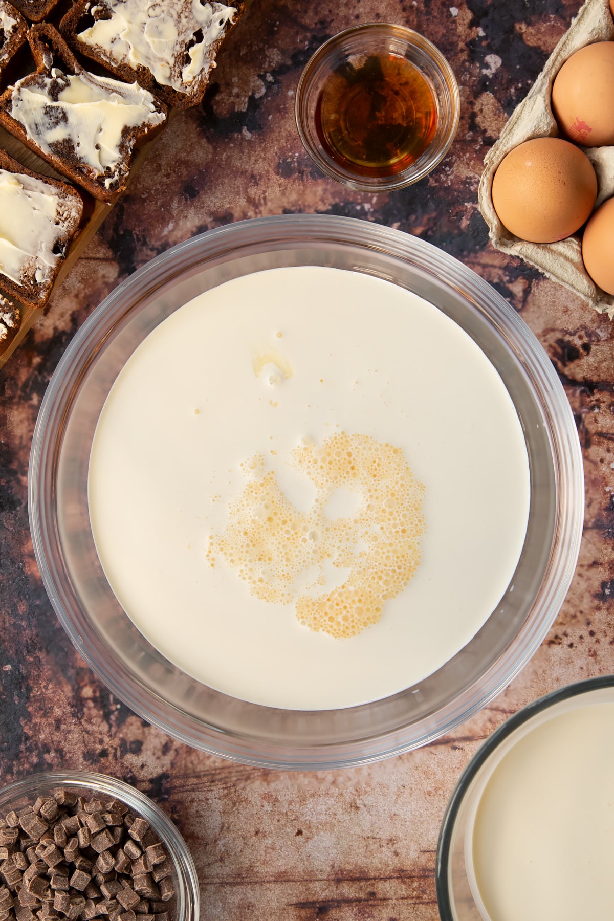 milk, cream, vanilla extract, eggs and sugar in a large bowl.