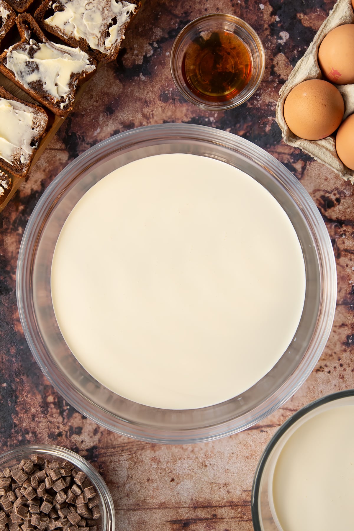 mixed milk, cream, vanilla extract, eggs and sugar in a large bowl.