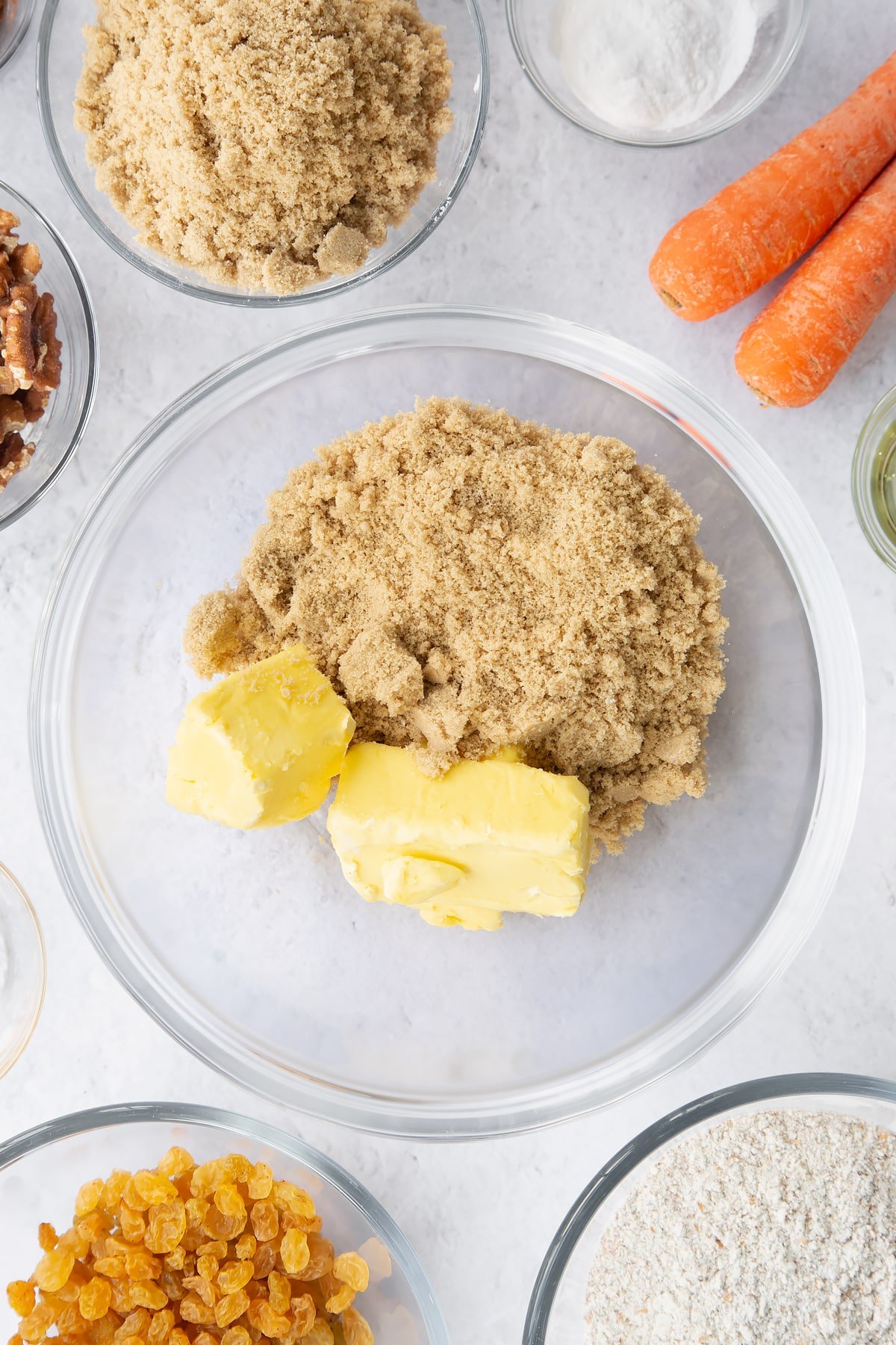 vegan butter, oil and sugar in a large clear bowl.