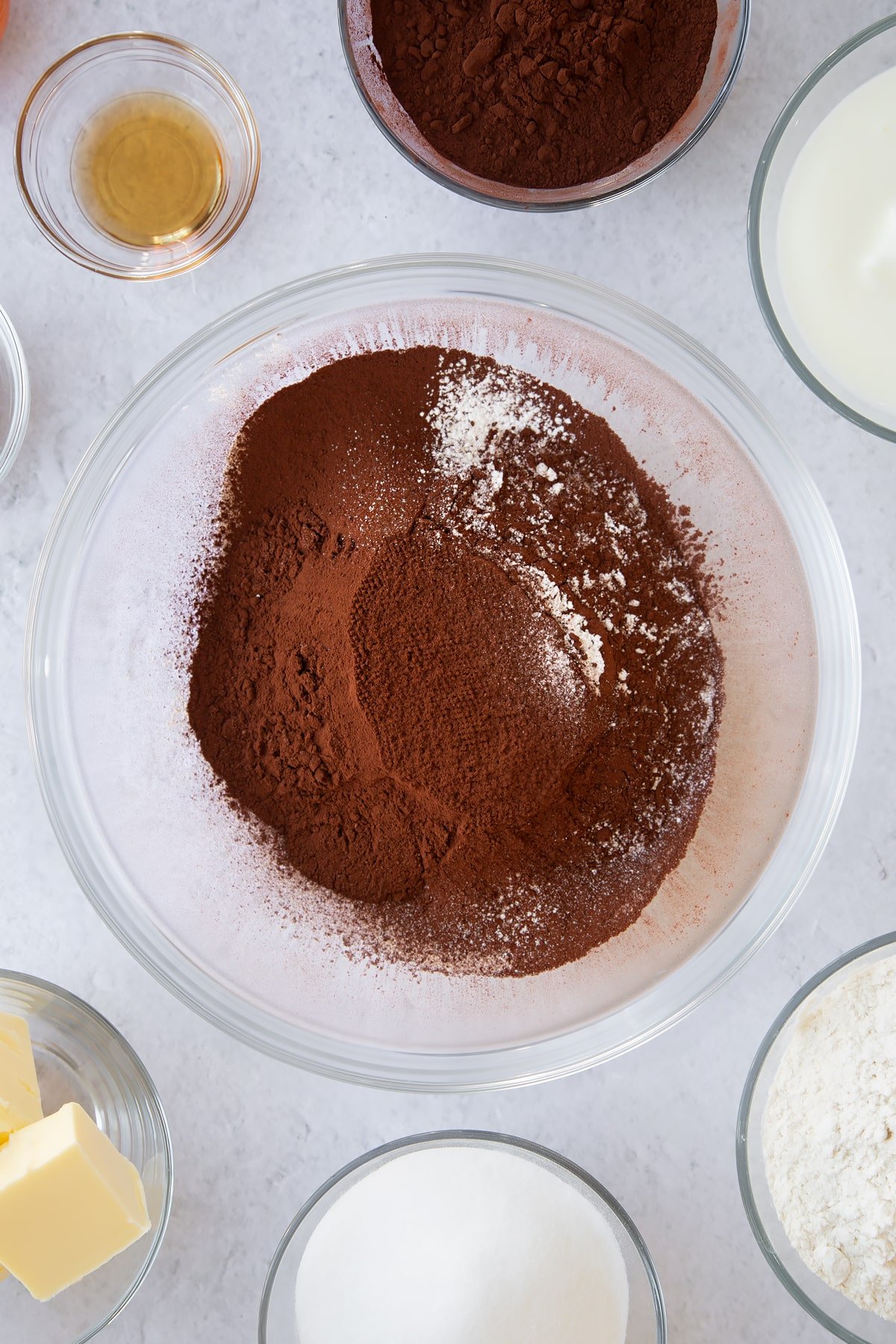 flour, cocoa powder and baking powder in a large clear bowl.