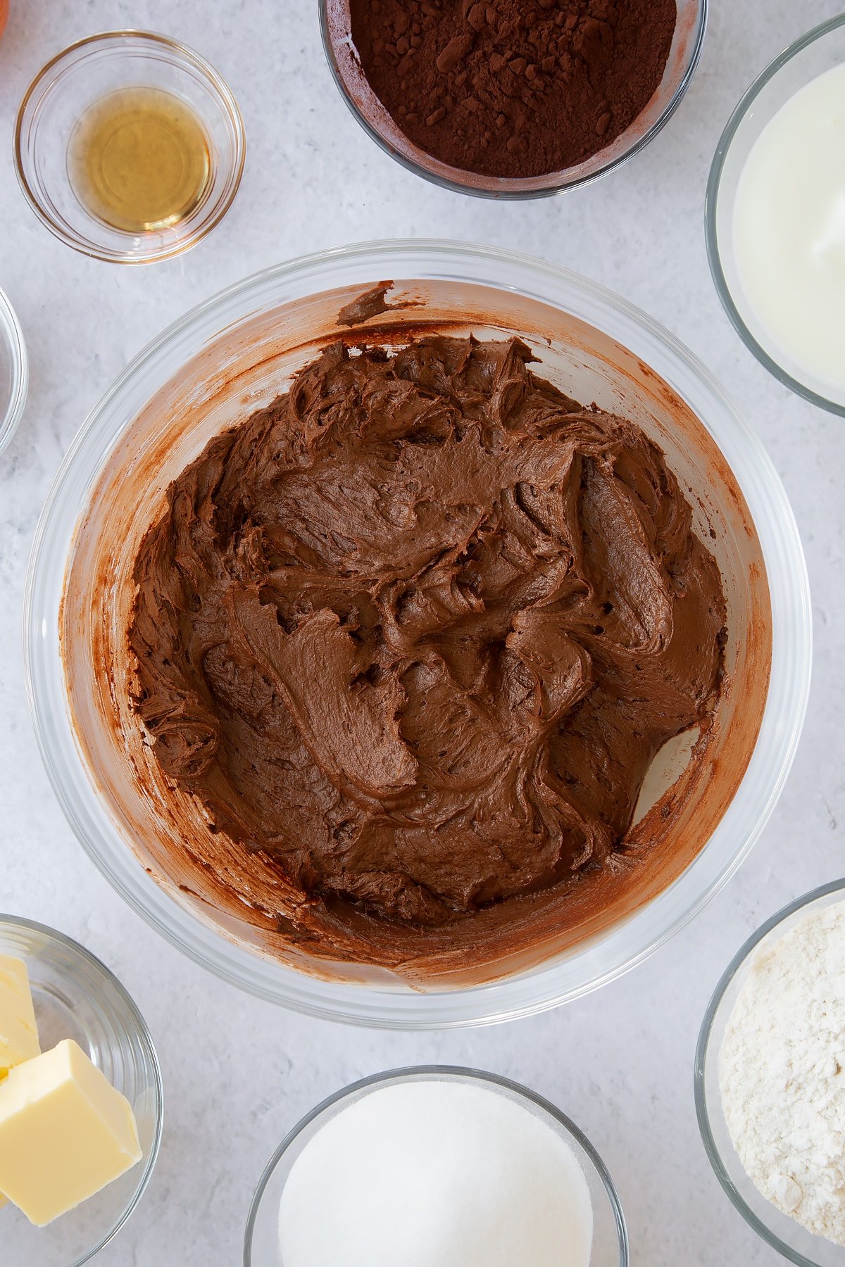 whisked chocolate whoopie pie batter in a large clear bowl.