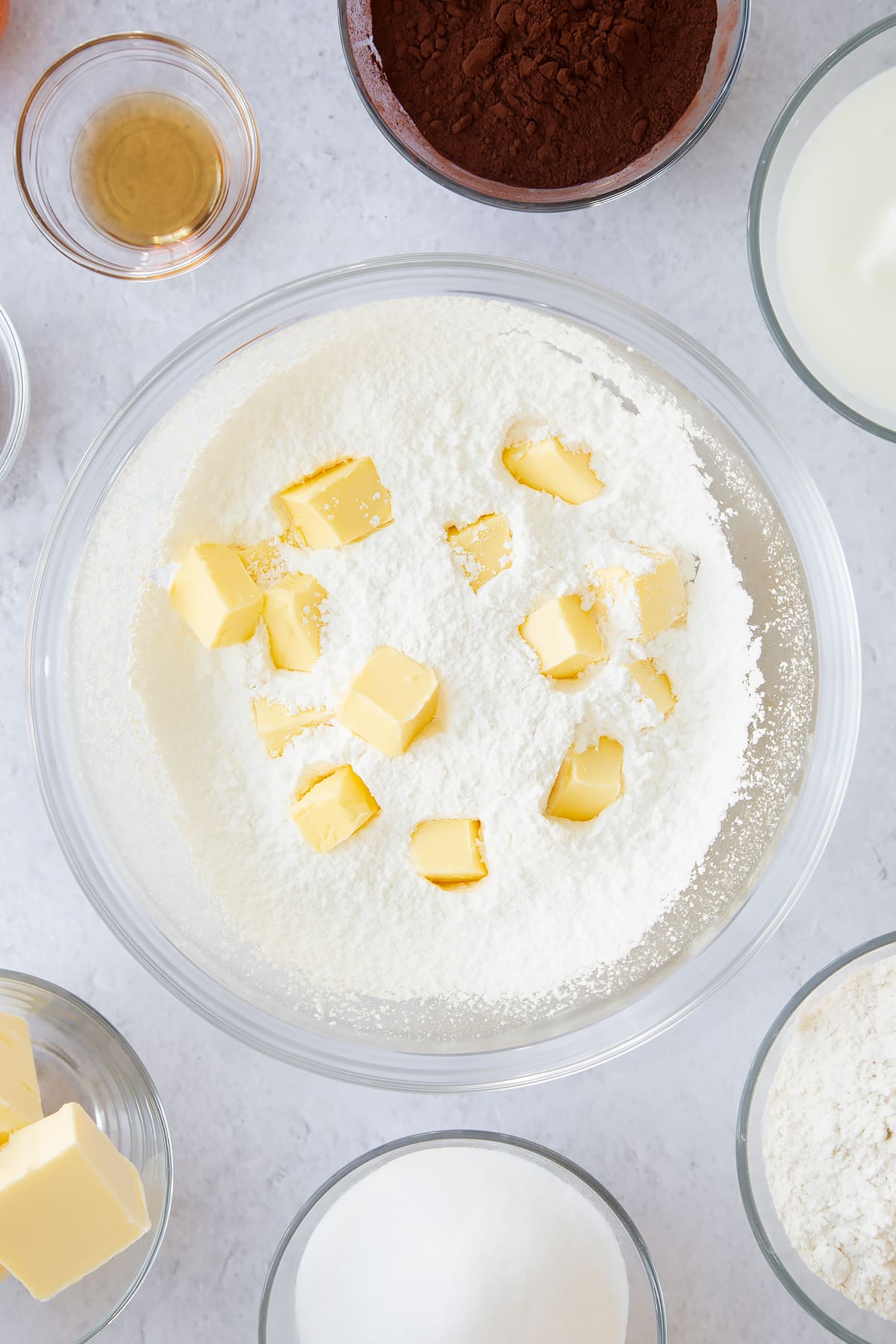 butter, vanilla and icing sugar in a large clear bowl.