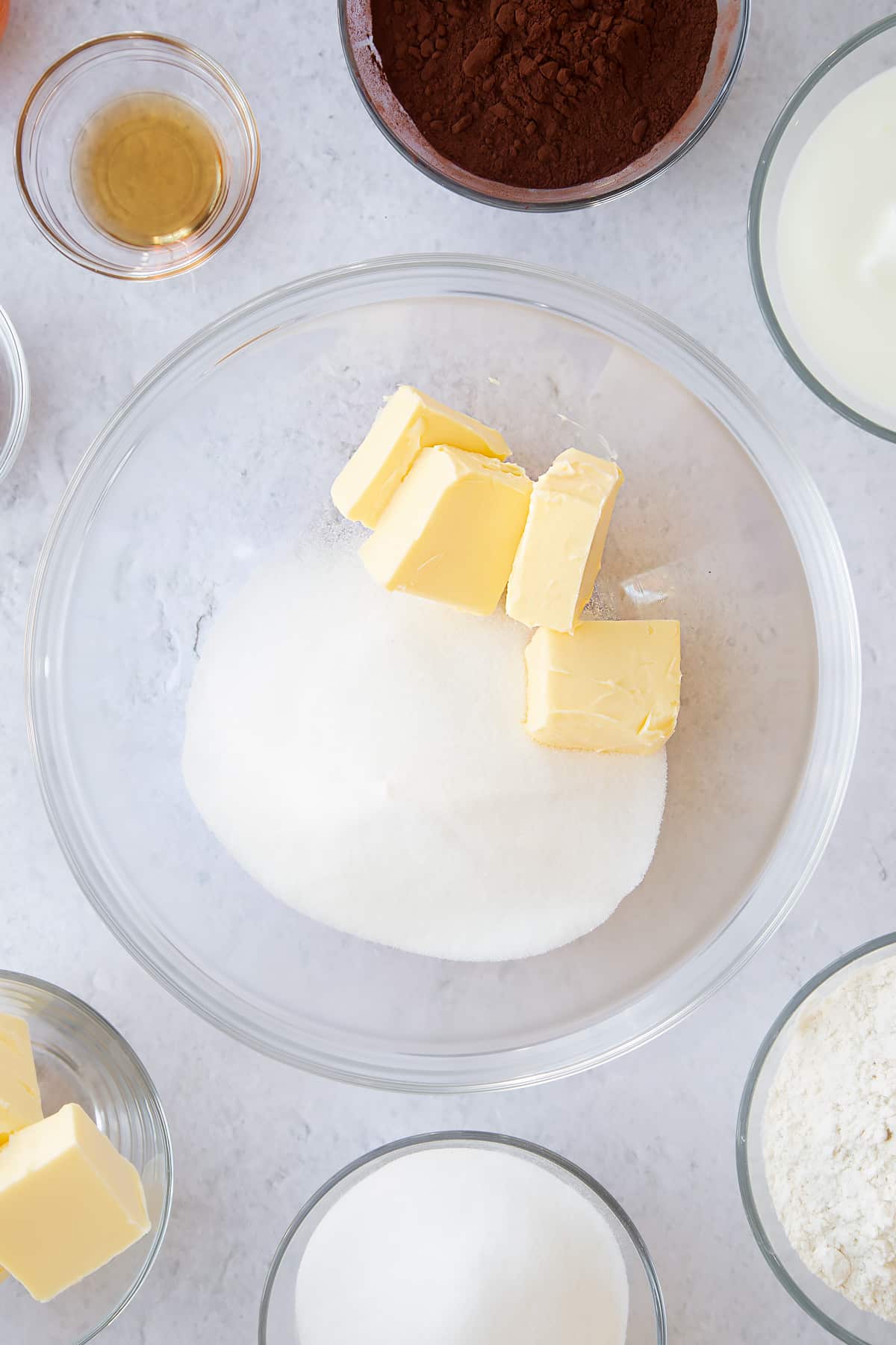 butter and sugar in a large clear bowl.