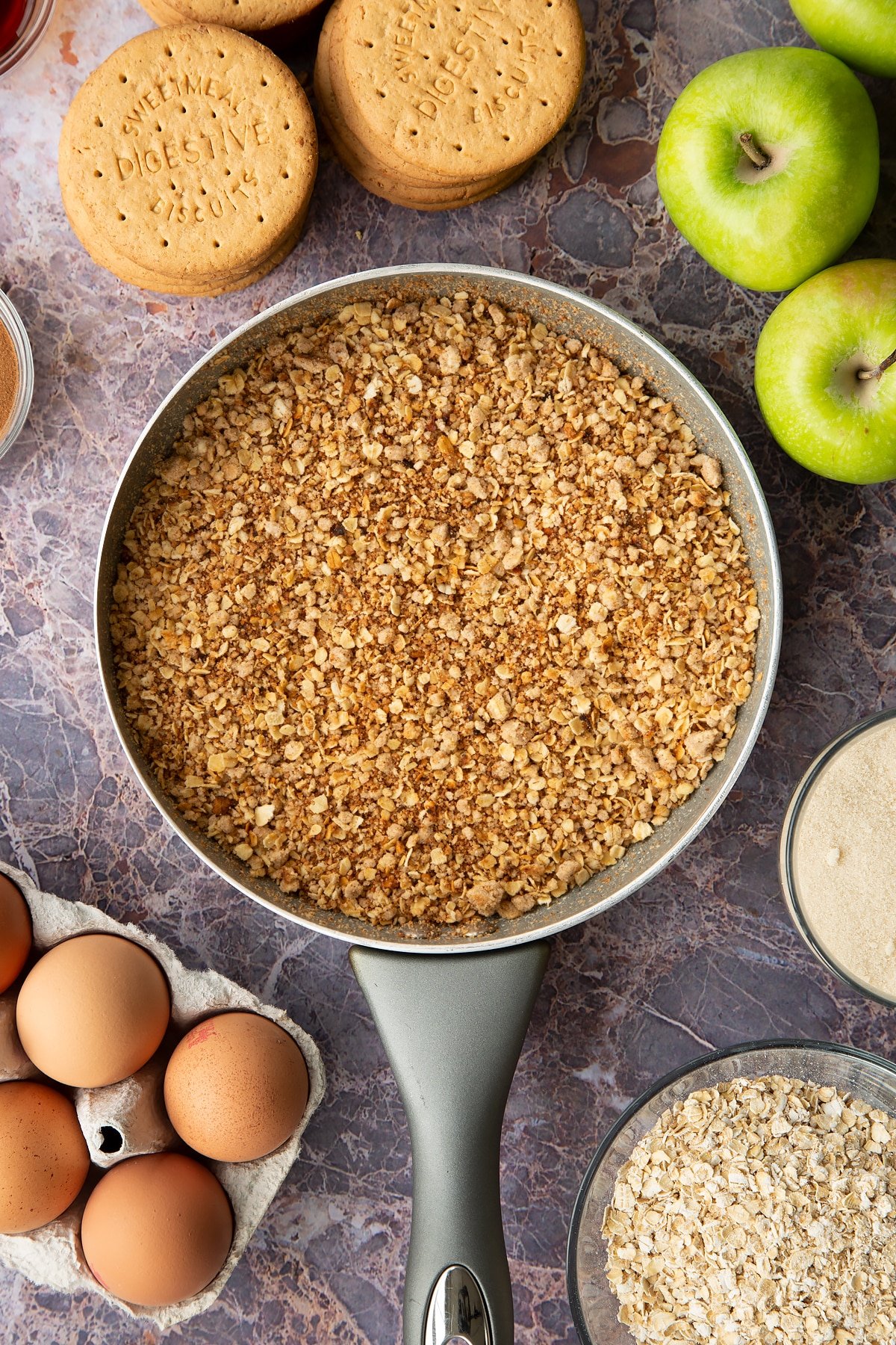 Toasting the crumble mixture until it's golden brown. 