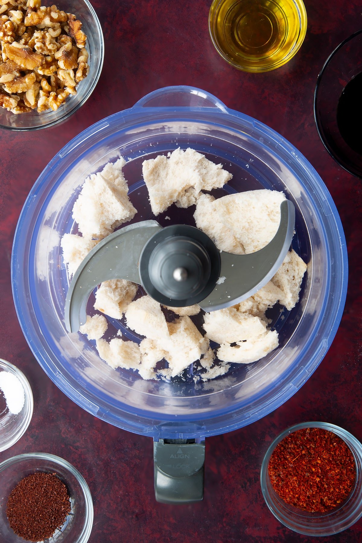 chunks of white bread in a food processor.