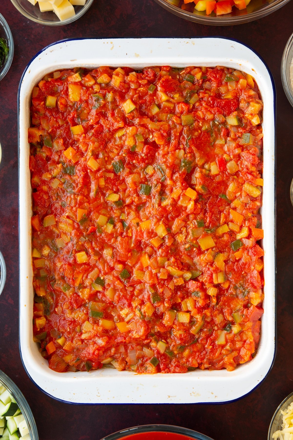 Overhead shot of the uncooked assembled lasagne.