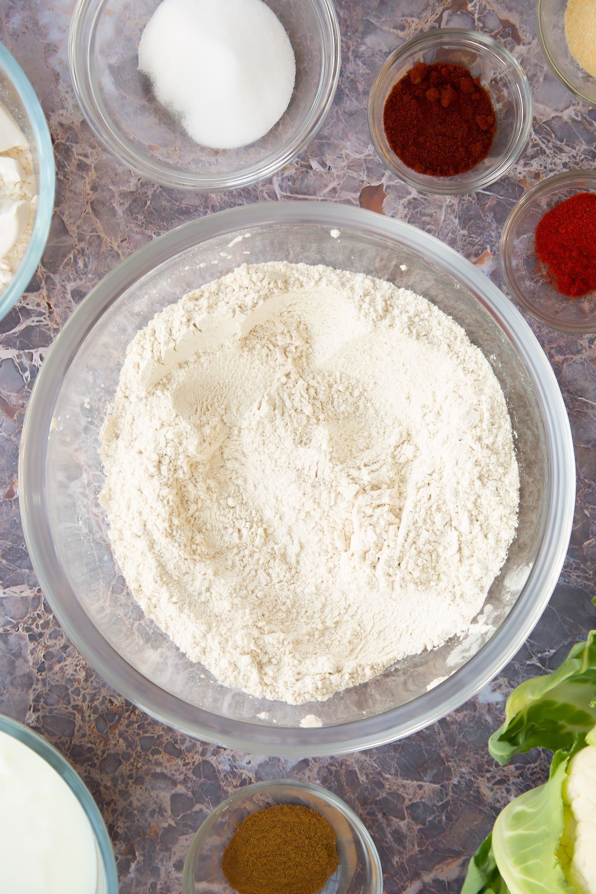 mixed flour, cayenne and garlic in a large clear bowl.