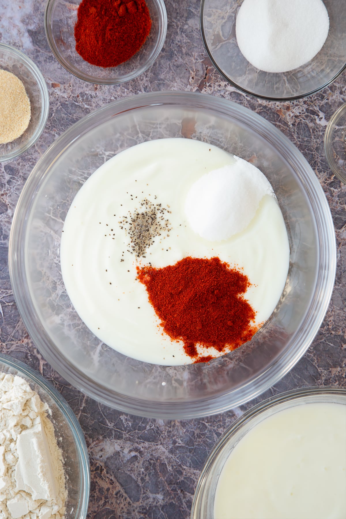 buttermilk, paprika and sugar in a large clear bowl.