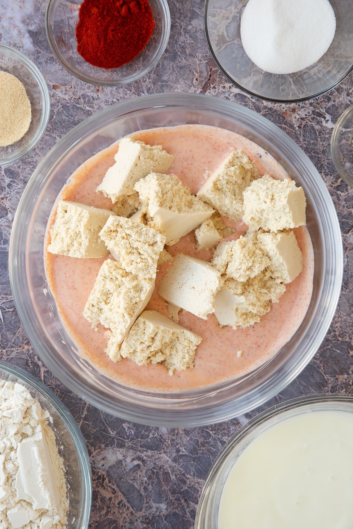 buttermilk paprika sauce topped with large crumb pieces of tofu.