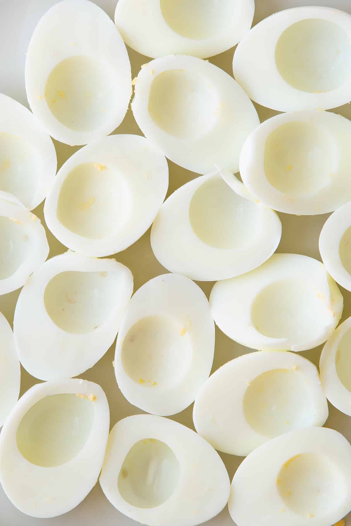 Boiled eggs cut open with the yolk removed.