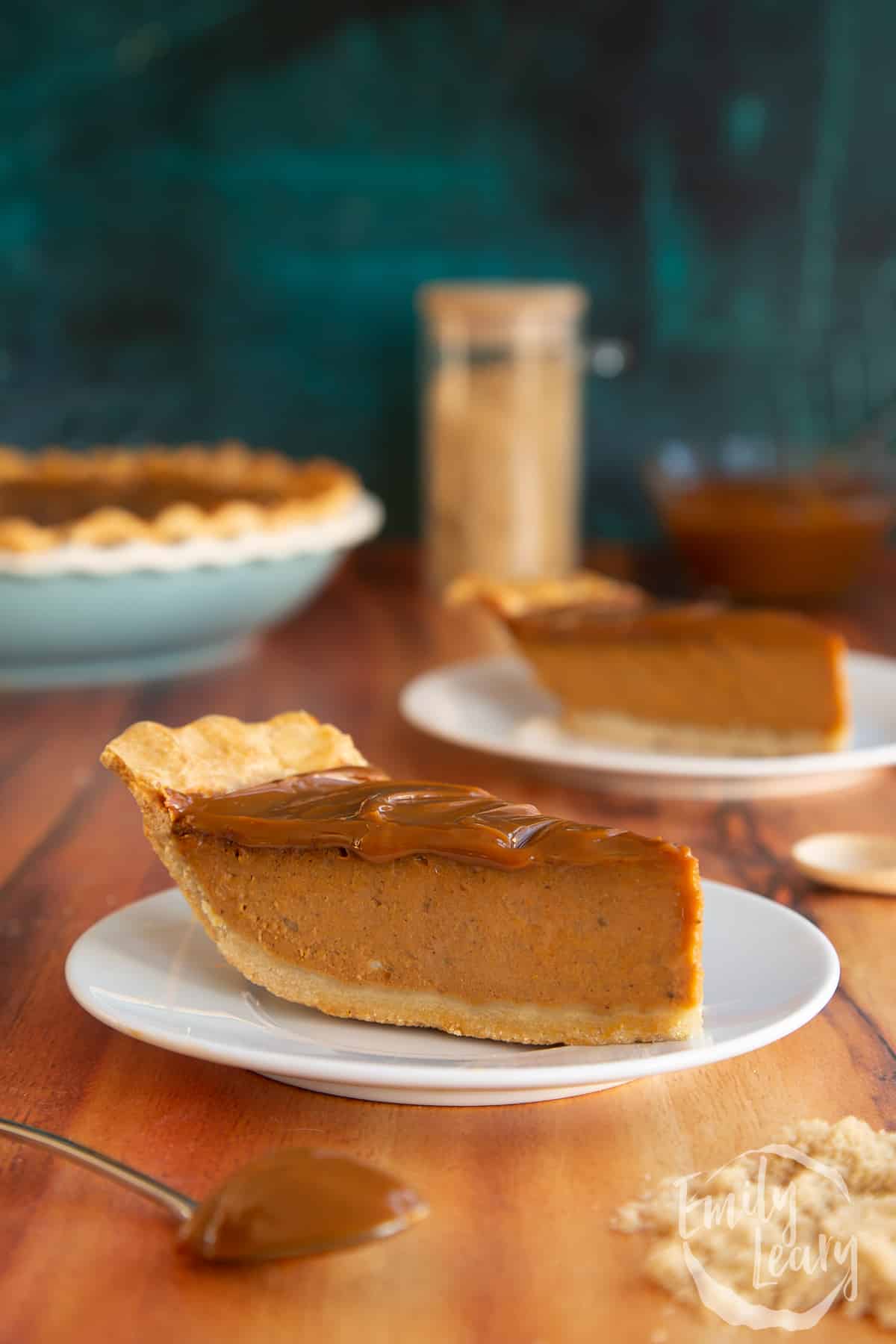 A slice of the finished caramel pumpkin pie