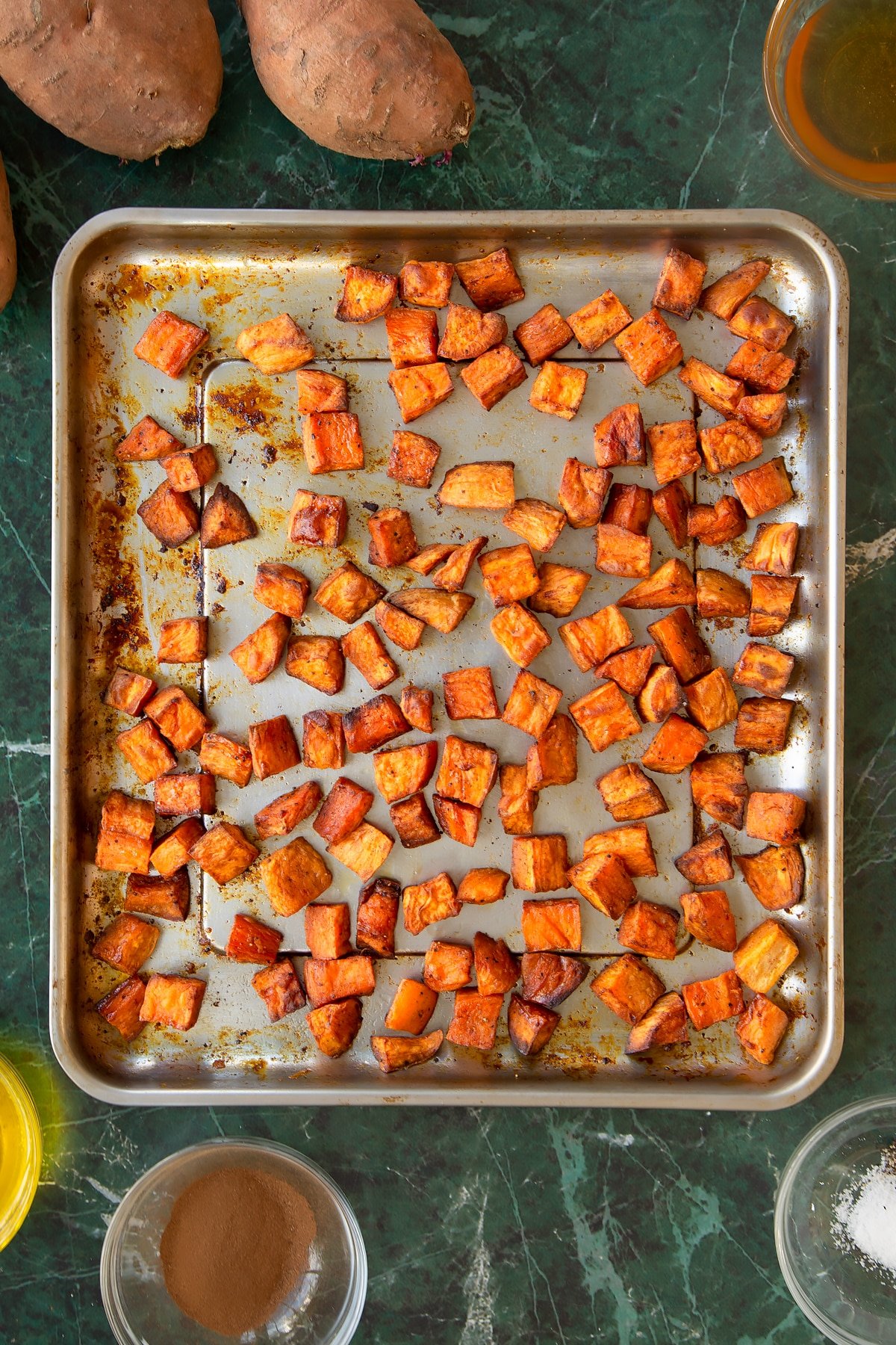 Overheadshot of the caramelised sweet potatoes having been roasted in the oven for 30 mins. 