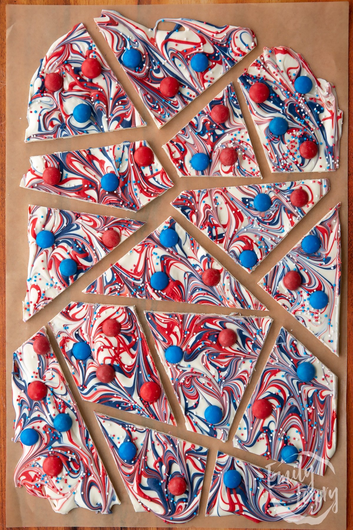 The finished red, white and blue bark. served on baking paper split into serving pieces. 