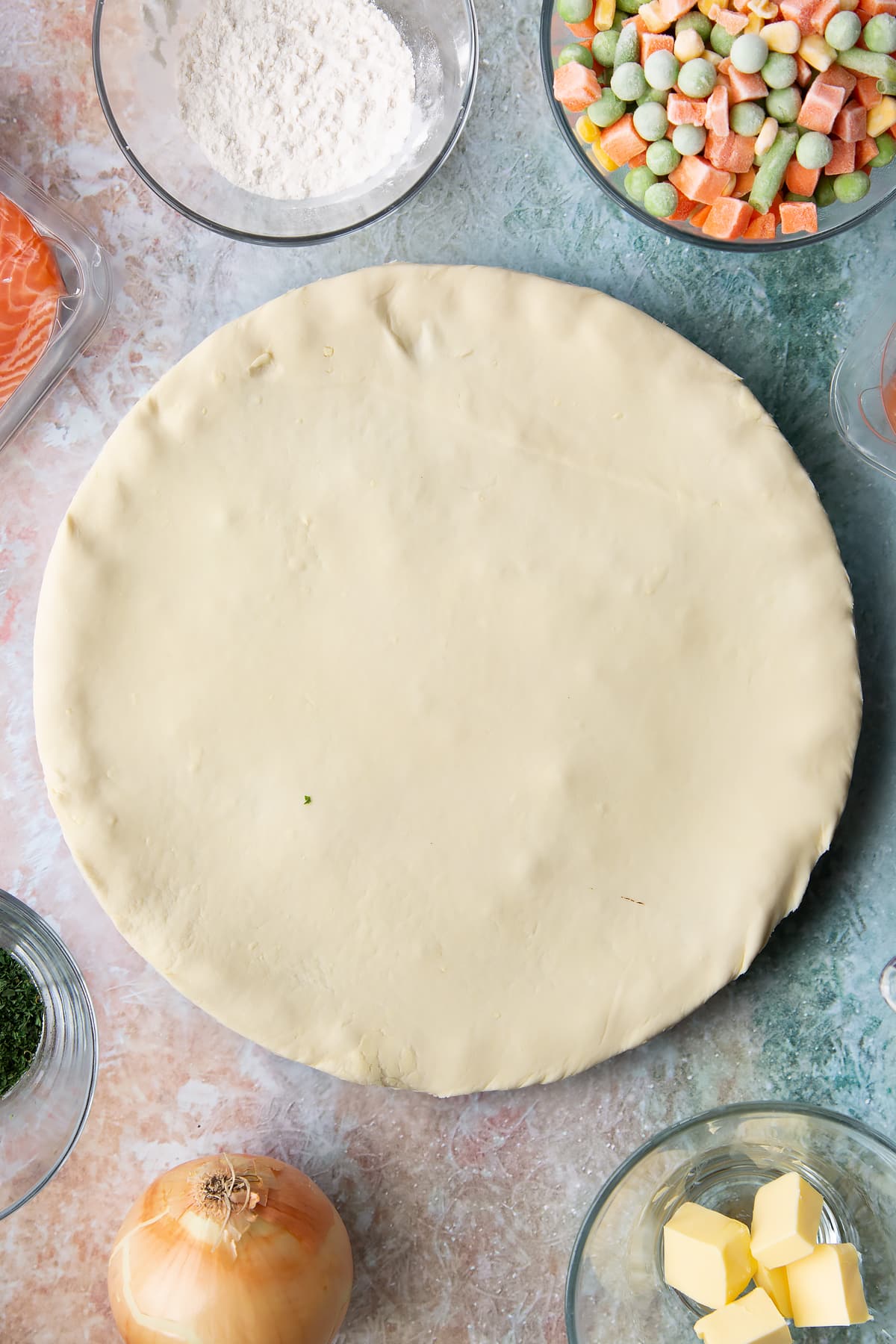 Overhead shot of the finished salmon pot pie before being moved to the oven.